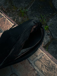 High angle view of abandoned shoes