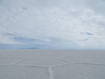 View of landscape against cloudy sky