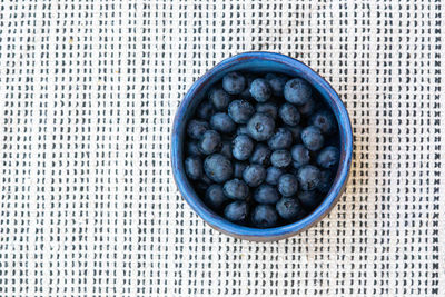 High angle view of fruits in bowl on table