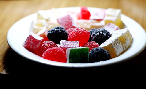 Close-up of fruits in bowl on table