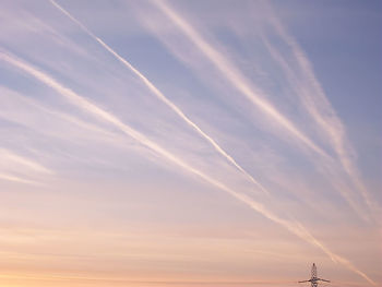 Low angle view of vapor trails in sky