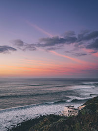 Scenic view of sea against sky during sunset