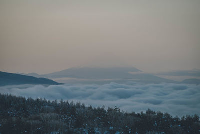 Scenic view of mountains against sky during sunset