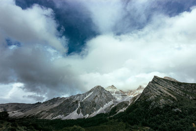 View of mountain range against cloudy sky