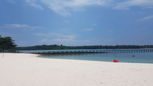 Scenic view of beach against sky