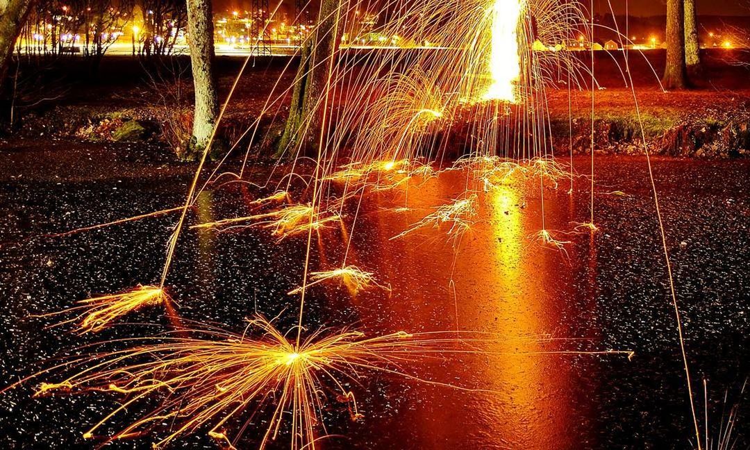 long exposure, illuminated, night, sparks, motion, glowing, firework - man made object, outdoors, firework display, burning, exploding, no people, sparkler, blurred motion, speed, light trail, celebration, wire wool, firework, nature, sky