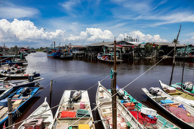 High angle view of fishing boats moored at harbor