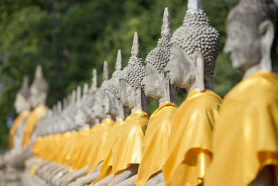 Buddha statues in row at wat yai chai mongkhon