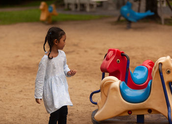 Cute girl playing at playground