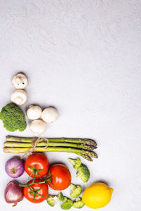 Directly above shot of fruits on white background