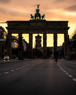 Rear view of man walking on street