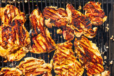 Close-up of meat on barbecue grill