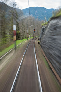 Blurred motion of car on road