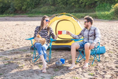 People sitting in tent