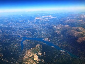 Aerial view of landscape and sea against sky