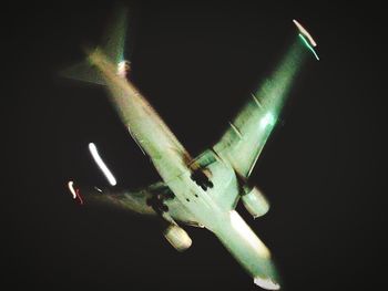 High angle view of illuminated airplane at night