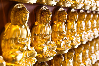 Full frame shot of buddha statue for sale at store