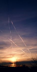 Scenic view of landscape against sky at sunset
