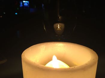 Close-up of lit candle