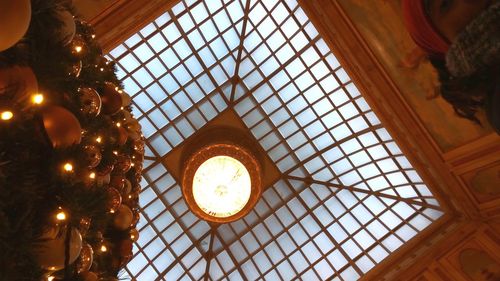 Low angle view of illuminated ceiling