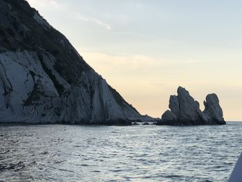 Scenic view of sea against sky at sunset
