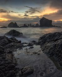 Scenic view of sea against sky during sunset