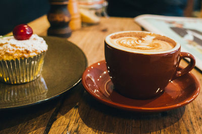 Close-up of coffee served on table