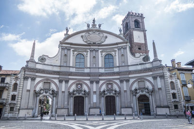 Facade of historic building against sky