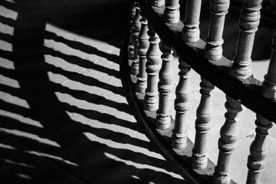 Shadow of bannisters on floor