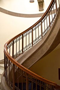 Low angle view of spiral staircase in building