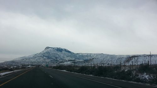 Road leading towards mountains