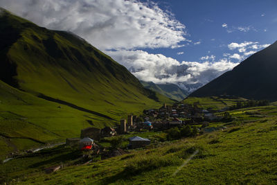 High angle view of road by mountains against sky