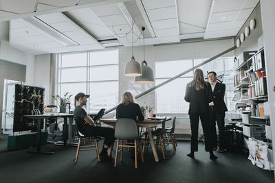 People talking during business meeting