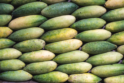 Full frame shot of lemons for sale at market stall