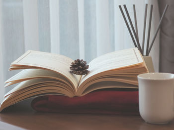 Close-up of open book on table