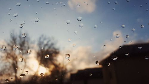 Full frame shot of raindrops on window