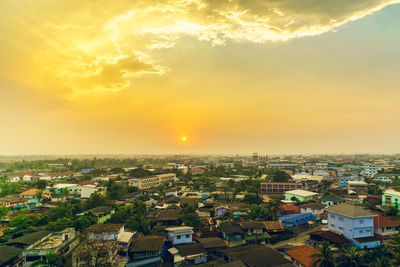 High angle view of townscape against sky during sunset