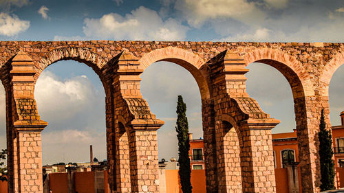 Low angle view of historical building against sky