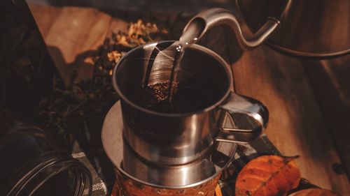 High angle view of coffee cup on table