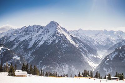 Scenic view of snowcapped mountains against sky