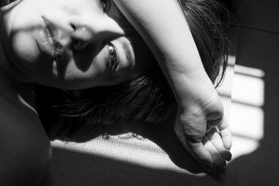 Close-up portrait of woman at home