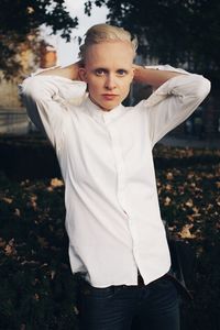 Portrait of cute girl standing on land