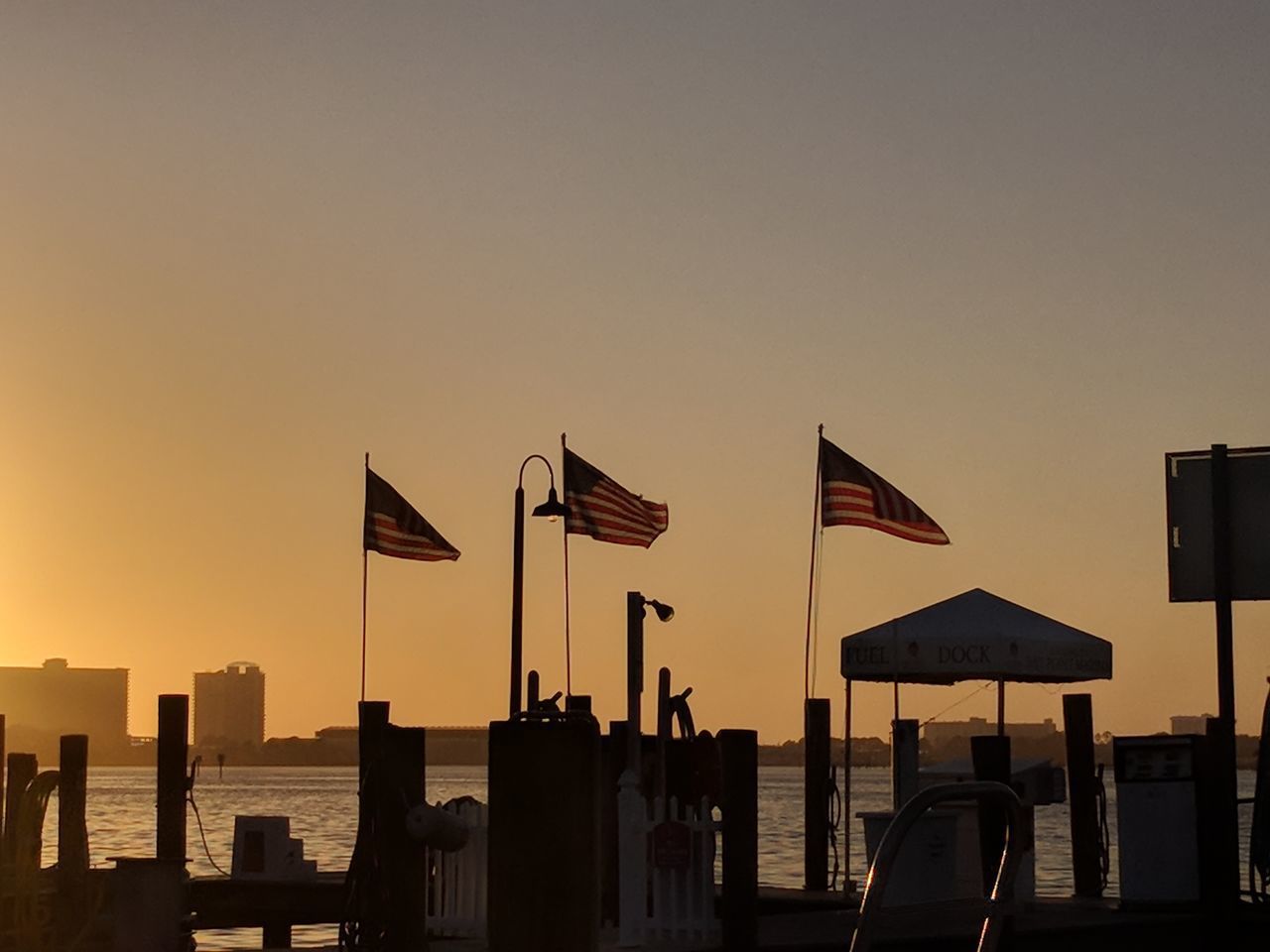 SILHOUETTE FLAG AGAINST SKY