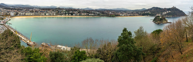 Wide panoramic view of the famous la concha bay in san sebastian, basque country, spain