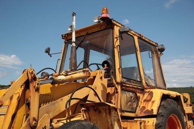 Low angle view of abandoned construction against sky