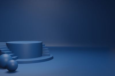 Close-up of ball on table against blue background