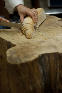 Midsection of person preparing food