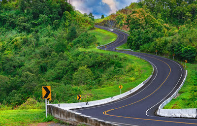 Road no.3 or sky road over top of mountains with green jungle in nan province, thailand