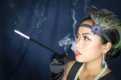 Portrait of young woman looking away