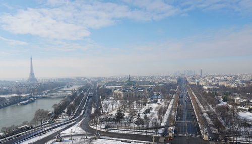 High angle view of paris under snow in winter